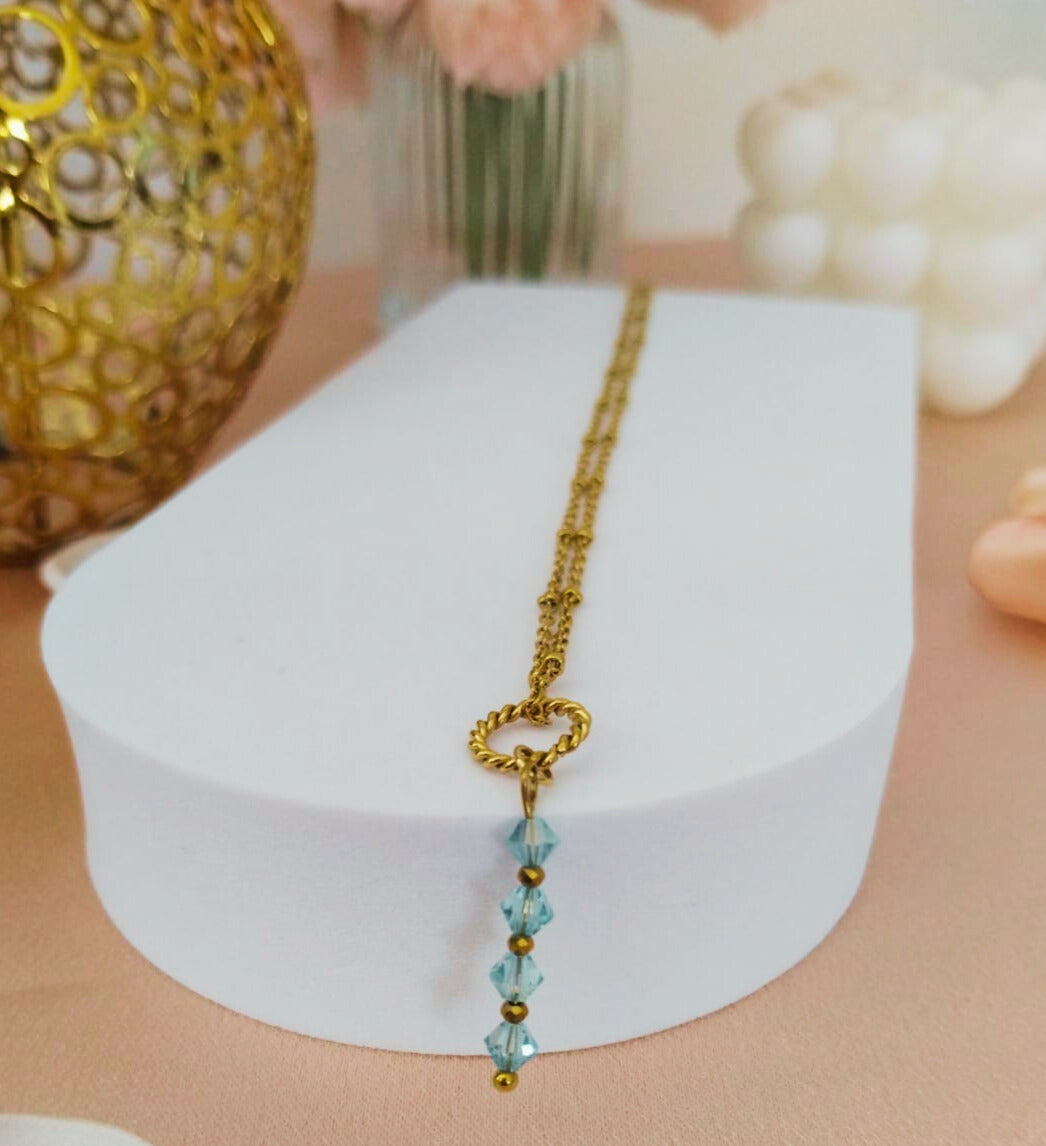 Collier "Sérénité Cristalline" - Swarovski Aigue-Marine 4mm, Cristal Teinté Doré, Chaîne à Bille Acier Inox