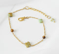 photo bracelet femme chrysoprase forme trefle et oeil de tigre facettée 4mm sur chaine 