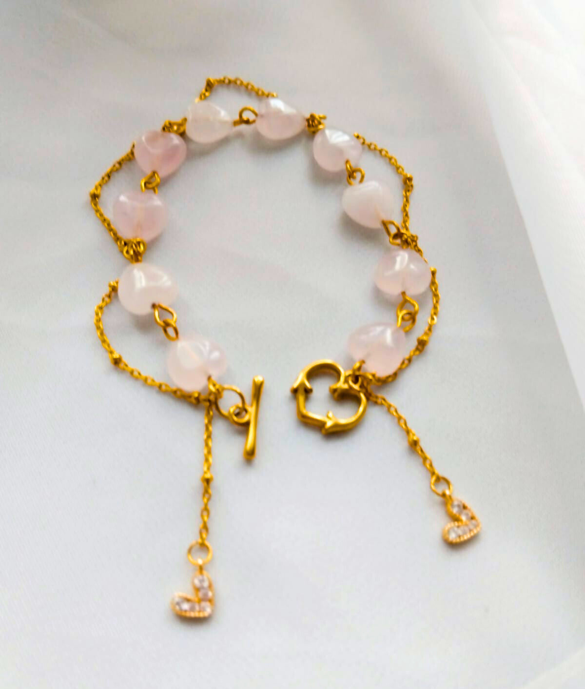 bracelet femme quartz rose avec chaine à billes et pendentif coeur