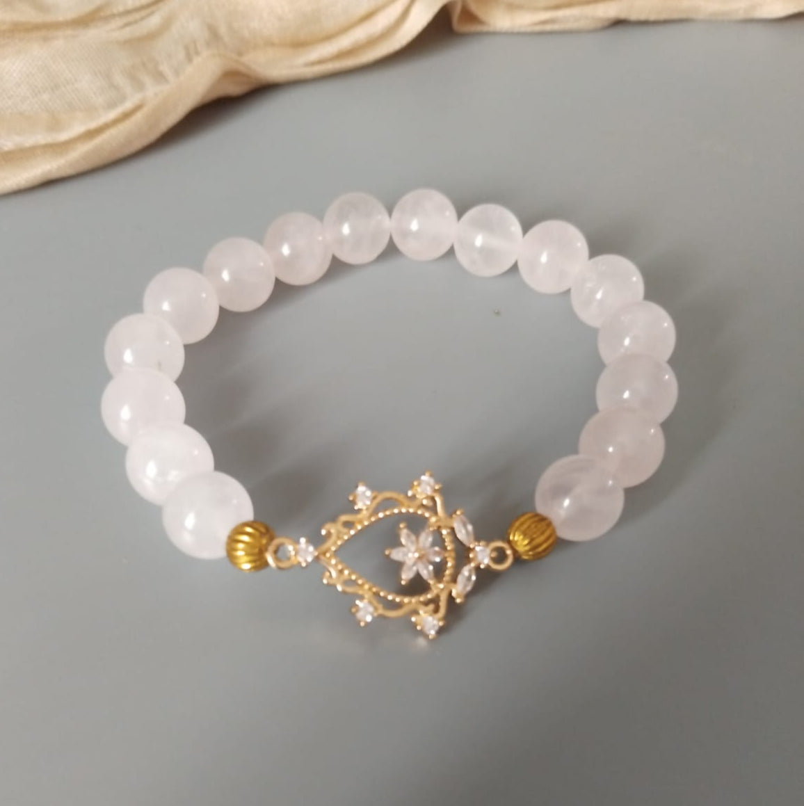 photo bracelet quart rose 10mm  connecteur fleuri à strass