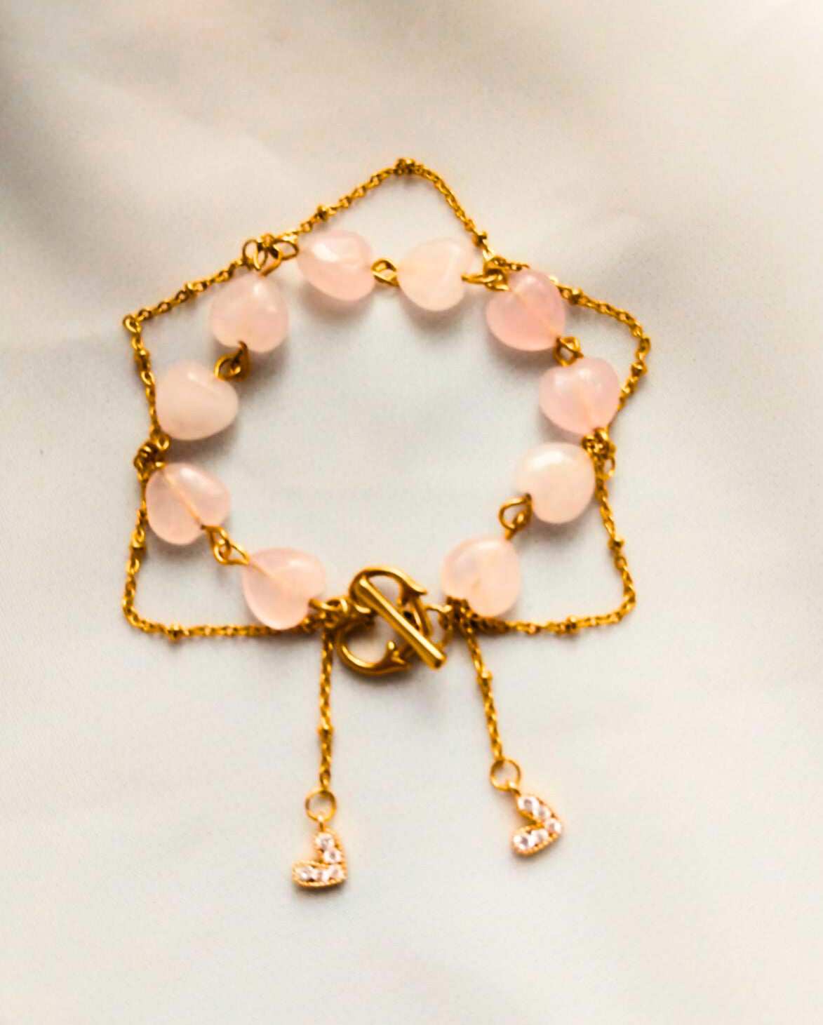 bracelet femme quartz rose avec chaine à billes et pendentif coeur