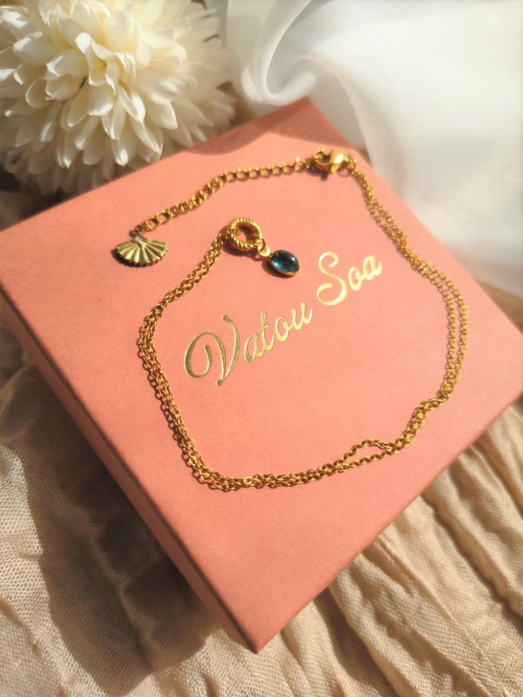 photo collier chaine acier inoxydable avec pendentif topaze bleu forme goutte