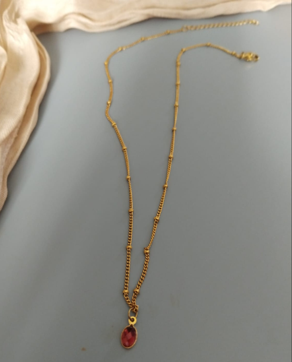 photo collier grenat rhodolite avec chaine acier inoxydable